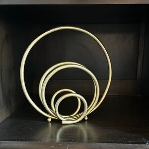 Gold Circular Metal Sculpture